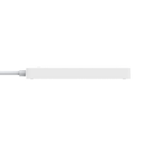 A white corded device with a green background and three USB ports and three grounded outlets for devices.