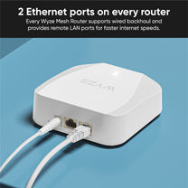 The Wyze Wi-Fi 6 Mesh Router is shown on a blue table.
